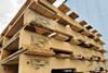 Stack of heat treated wooden pallets