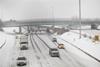 Motorist drive along a snow covered Interstate-94 in Detroit