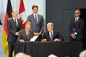 Canadian government representatives, including prime minister Justin Trudeau, sign an agreement for lithium supply with VW Group CEO Herbert Diess