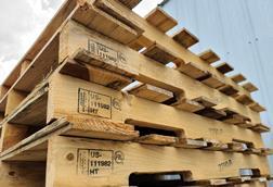 Stack of heat treated wooden pallets