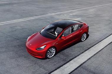 Tesla_model_3_red_949159