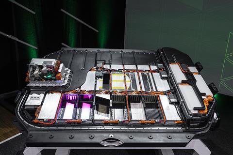 An image of an Audi battery pack, partially cut away to show the cells inside