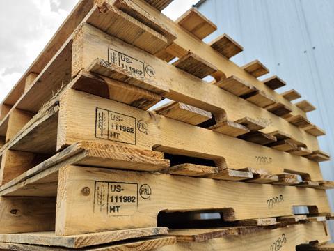 Stack of heat treated wooden pallets