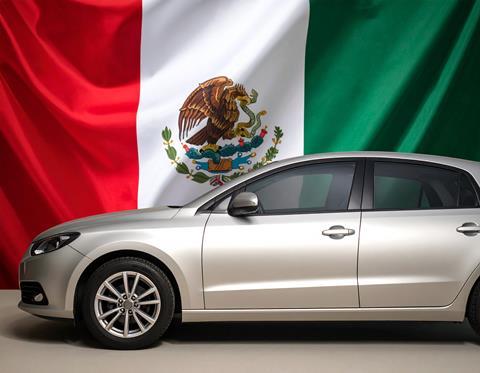 Car in front of the Mexican flag