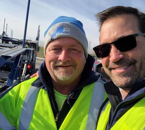 United Road President and CEO Mark Anderson (r.) with Tim Sandford, professional carhauler